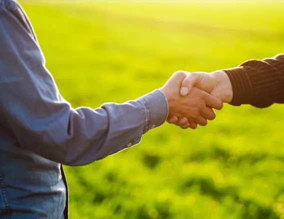 investors and property managers handshake trust image